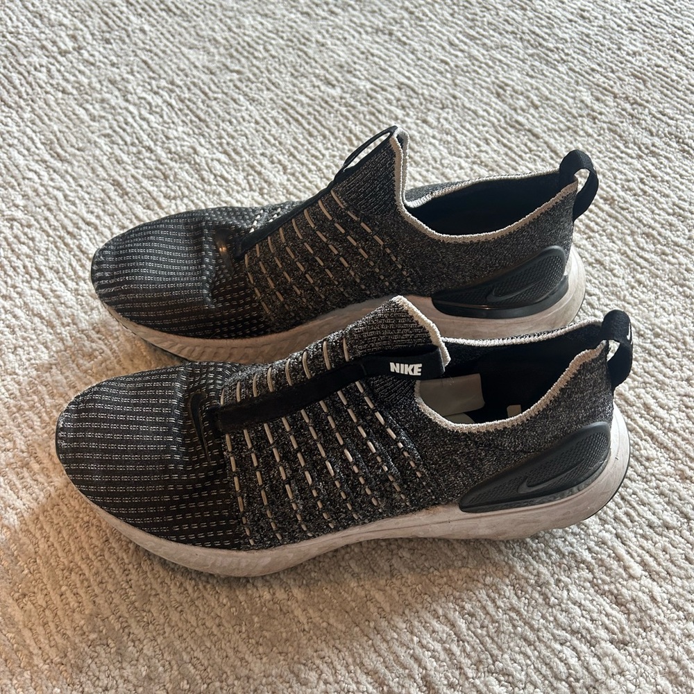 Nike Black and White Slip-On Sneakers with Cushioned Sole